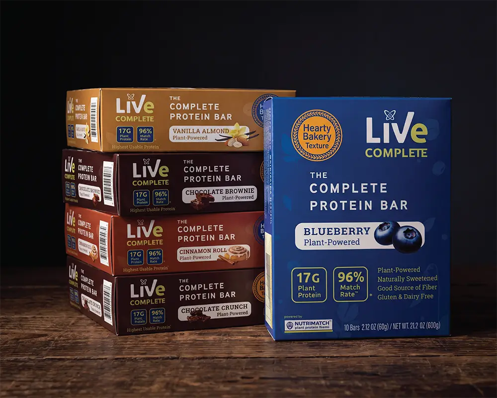 The Complete Protein Bar — five flavors, stacked