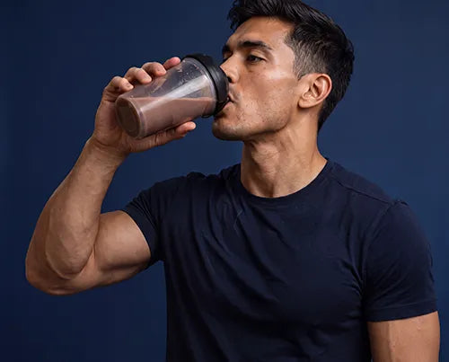Athlete drinking a LiveComplete protein shake